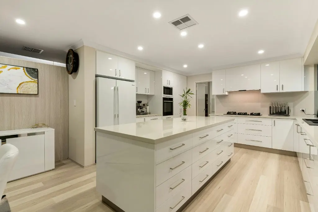 Wrapped kitchen cabinetry in a contemporary home